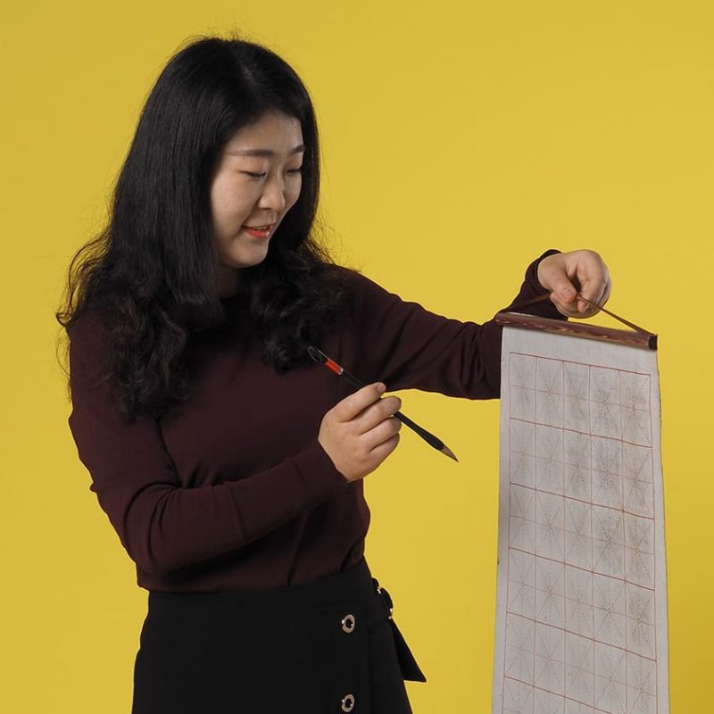 Teacher Caroline with calligraphy set