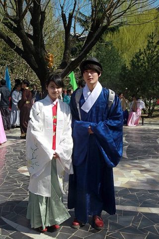 Man and women wearing traditional hanfu robes in modern China