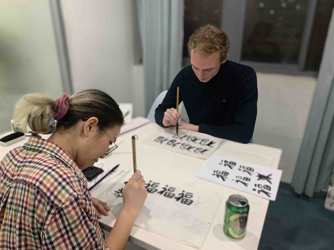 Practicing Calligraphy at LTL Shanghai